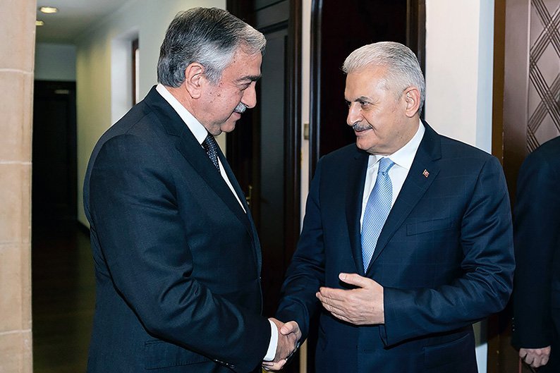 Turkish PM Binali Yildirim (right) with Mustafa Akinci in the north (CNA)