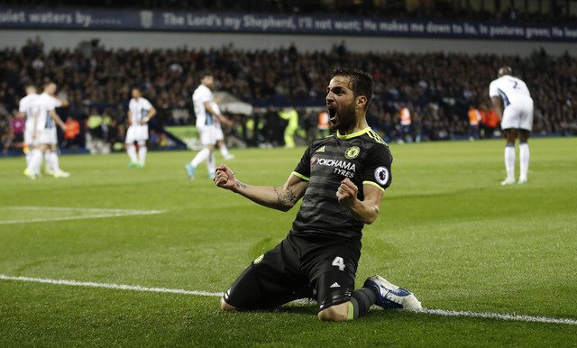 Chelsea's Cesc Fabregas celebrates after Michy Batshuayi  (not pictured) scores their first goal