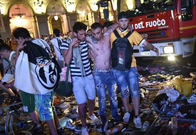 Hundreds of Juventus fans injured in stampede in Turin