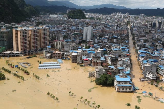 Heavy rains bring record flooding to Central, Southern China Heavy rains bring record flooding to Central, Southern China