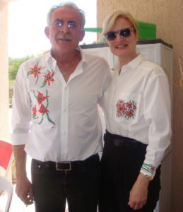 Antonis and Constance Nicandrou in hand-painted, tulip-themed shirts