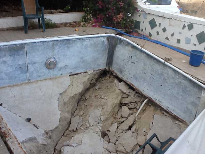 Debbie Evans' collapsed pool before it was filled in