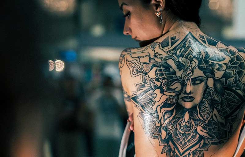 cover Commissioner warns lack of regulation puts tattoo and piercing industry at risk