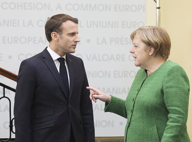 Merkel admits differences with Macron