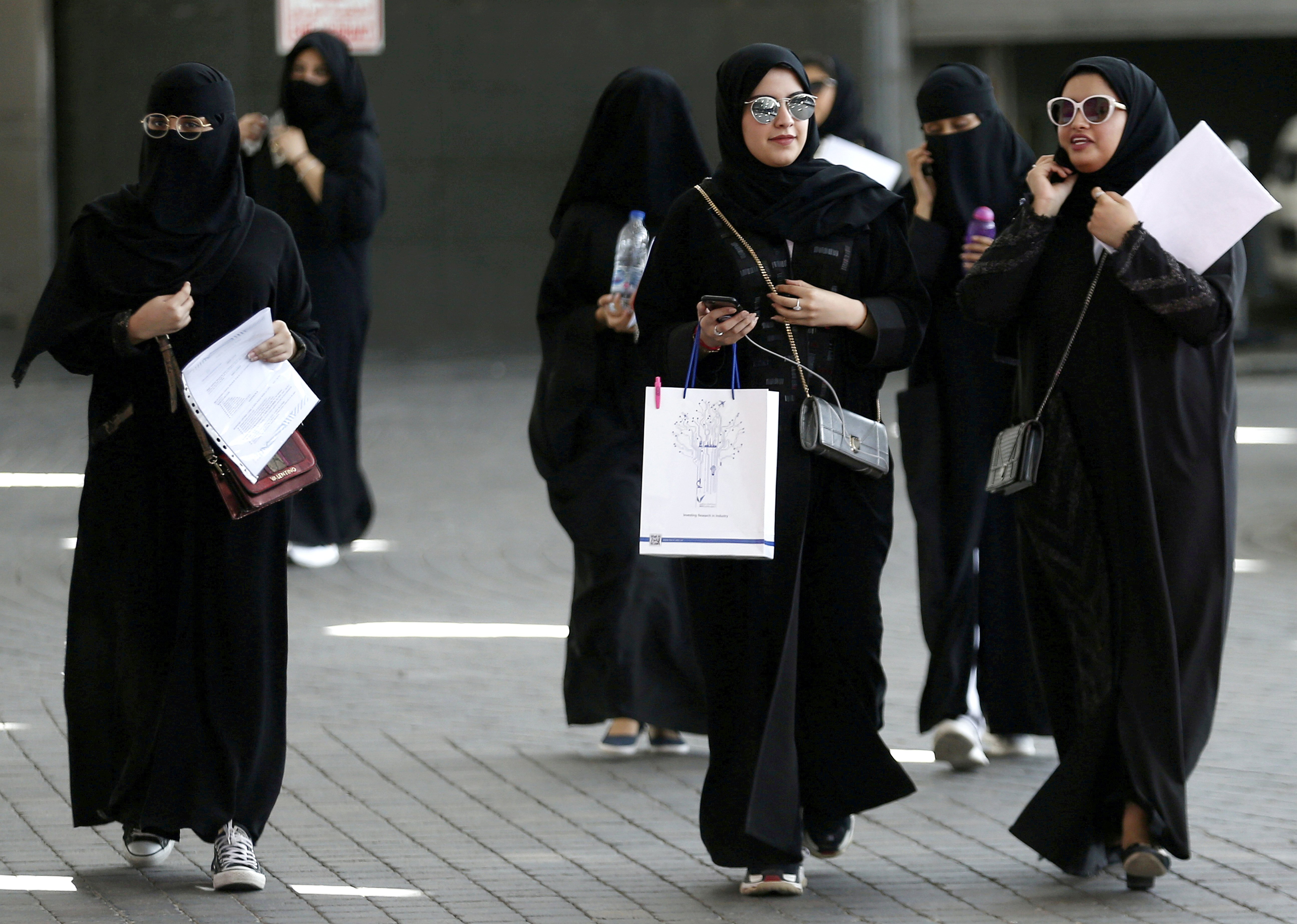 Saudi Arabia lifts travel restrictions on women, grants them greater contro...
