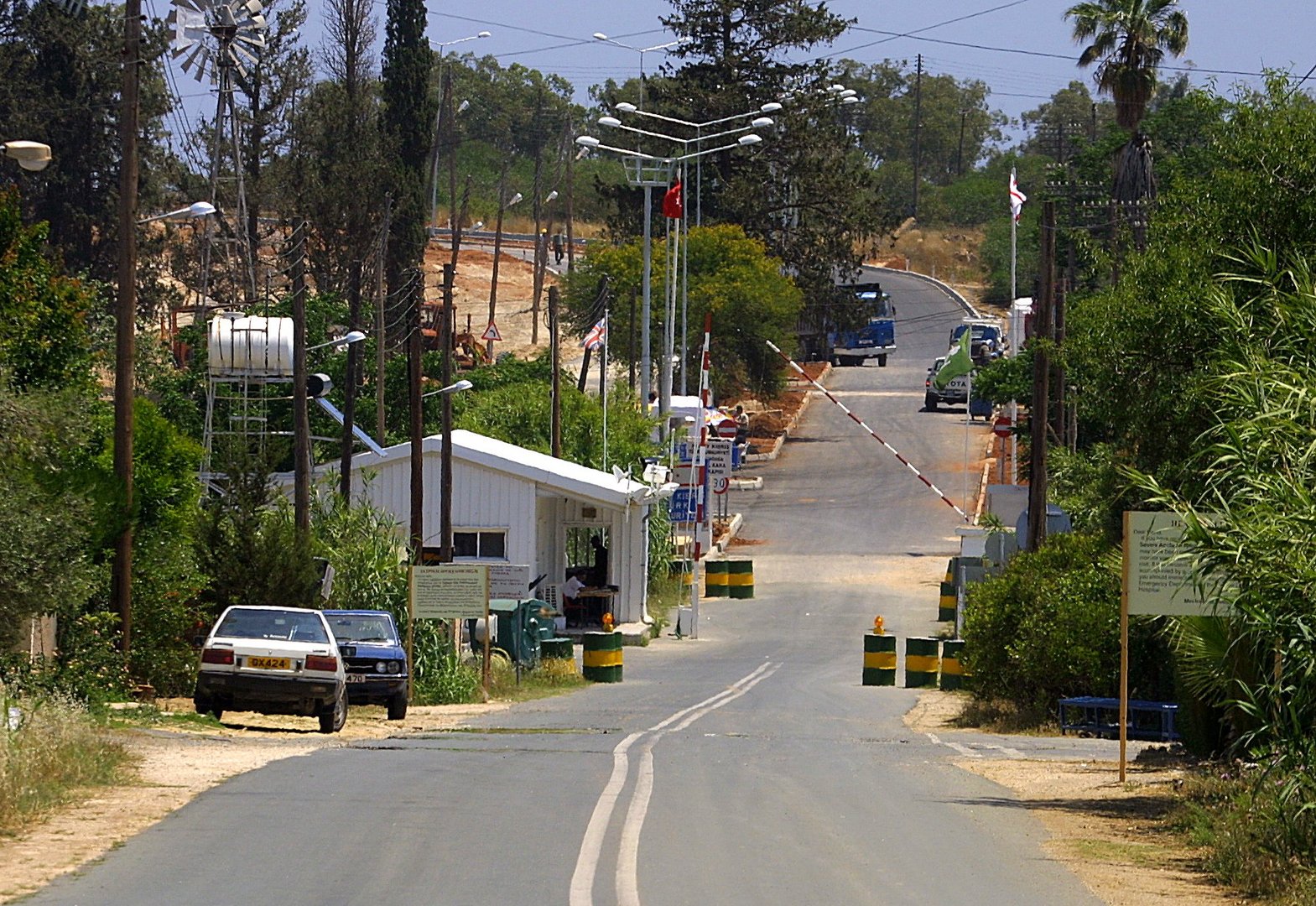 Greek Cypriots arrested in north taken back to crossing point