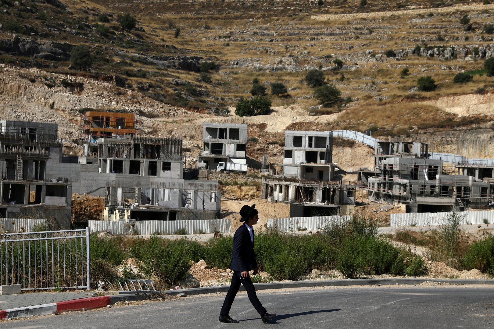 image Israel takes Palestinian minister&#8217;s VIP pass in world court flap