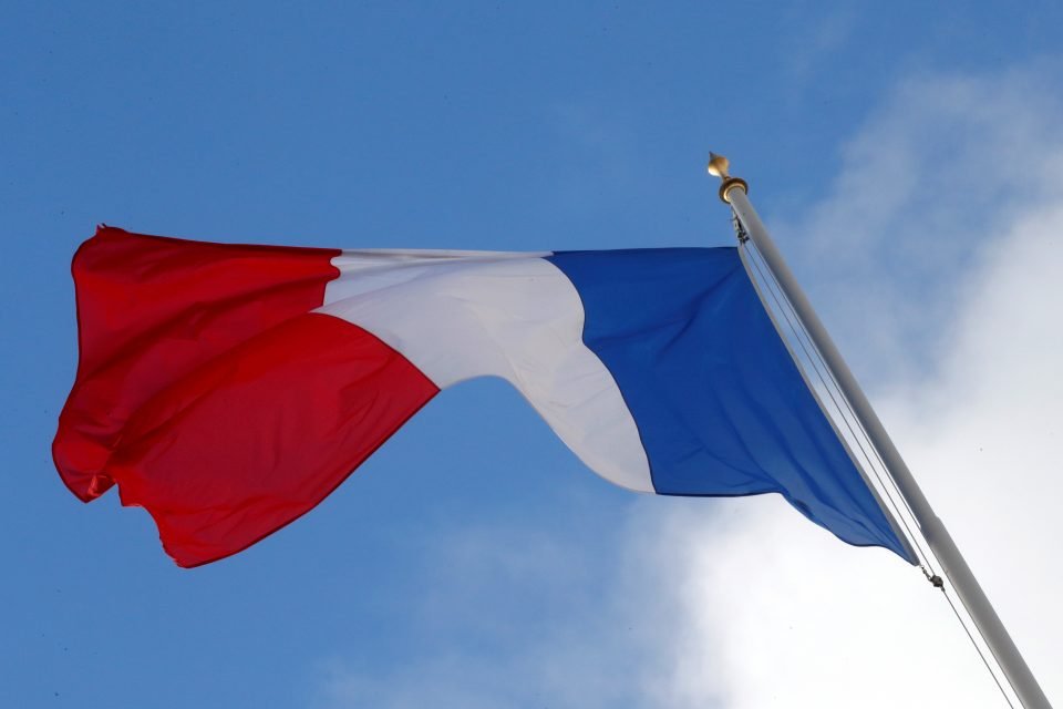 File Photo: A French Flag Flutters In The Sky Over The Elysee Palace In Paris