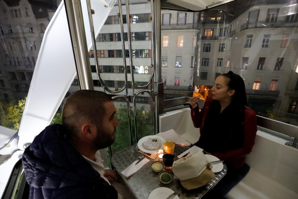 Lutor And Katus Enjoy Their Food As Michelin Starred Restaurant Costes Moves Into The Budapest Eye Ferris Wheel During The Coronavirus Outbreak
