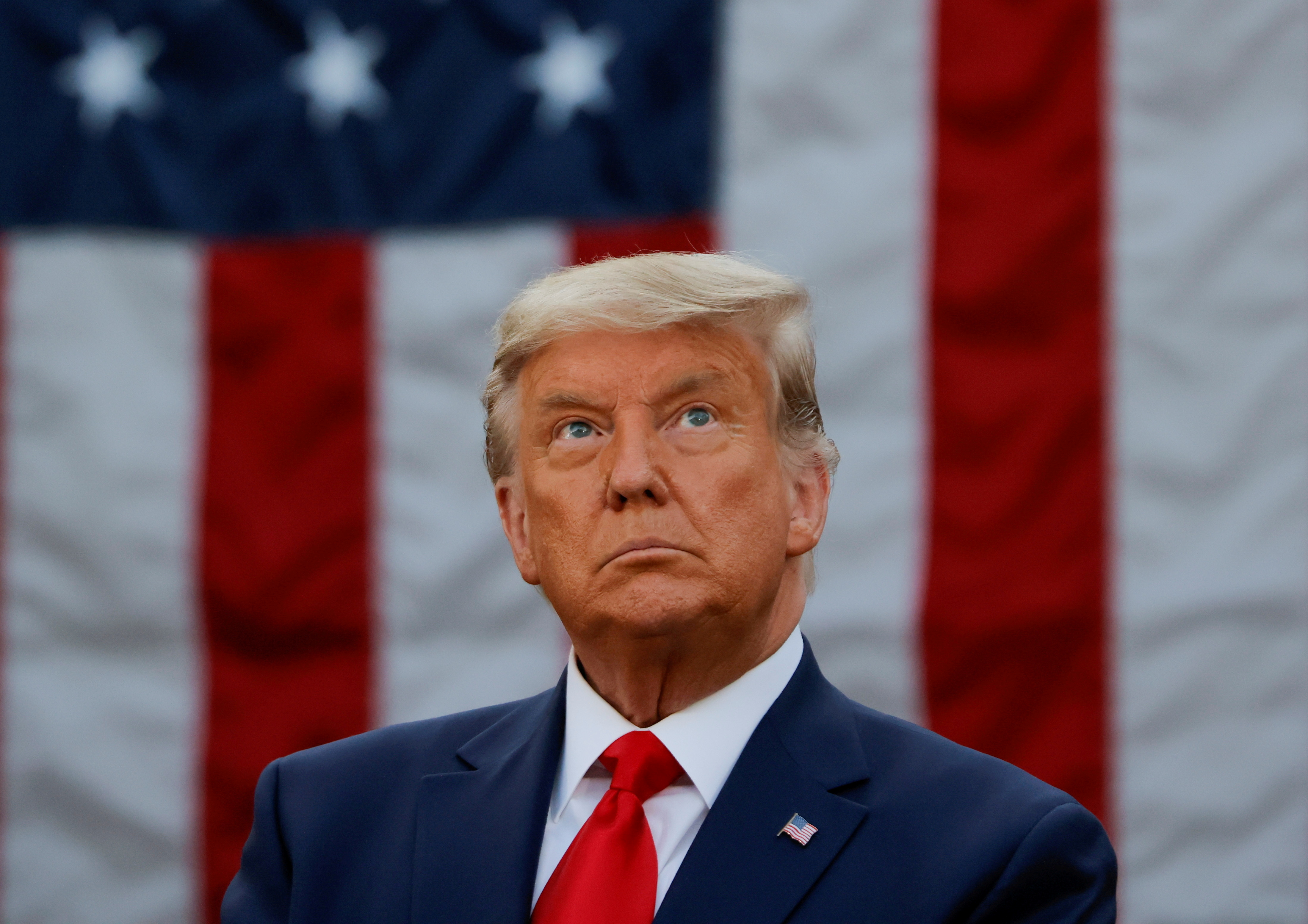 image In dueling New Year messages, Trump reflects while Biden looks ahead