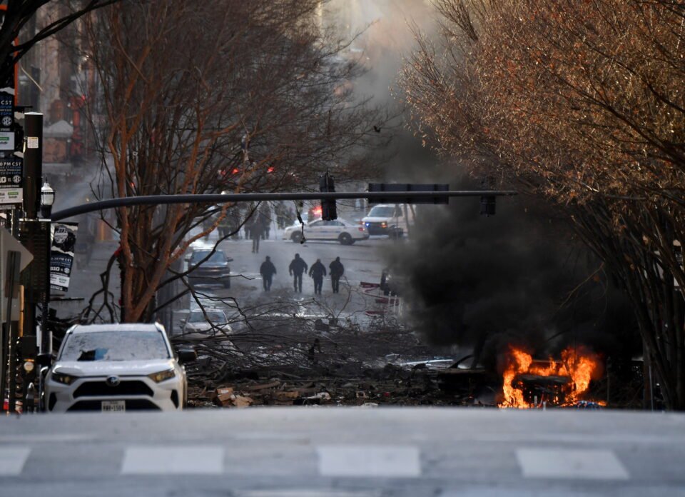 A Vehicle Burns Near The Site Of An Explosion In The Area Of Second And Commerce In Nashville