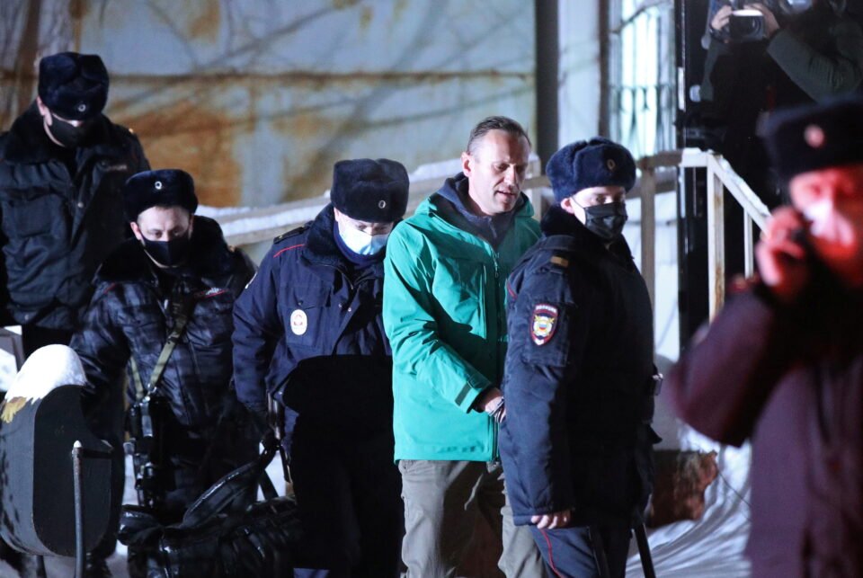 Russian Opposition Leader Alexei Navalny Is Escorted By Police Officers After A Court Hearing, In Khimki