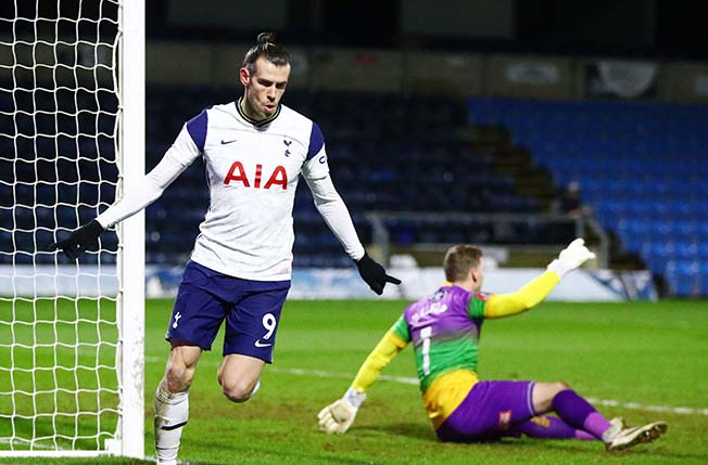 cover Late goal flurry earns Spurs Cup win at Wycombe