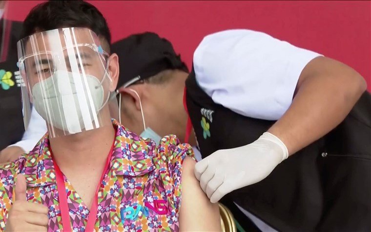 cover Instagram influencers a vaccine priority in wary Indonesia