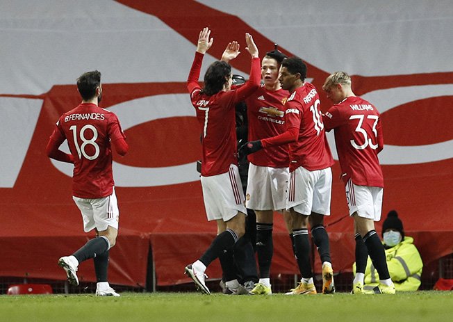 cover Man United edge past West Ham after extra time