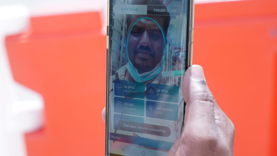 kajima employee gunasekar udayakumar uses the nervotec app to scan his face and check his vital signs as part of a daily checkup for employees at a construction site in central singapore