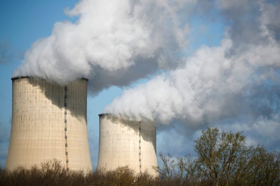 steam rises from the cooling towers of the golfech nuclear plant