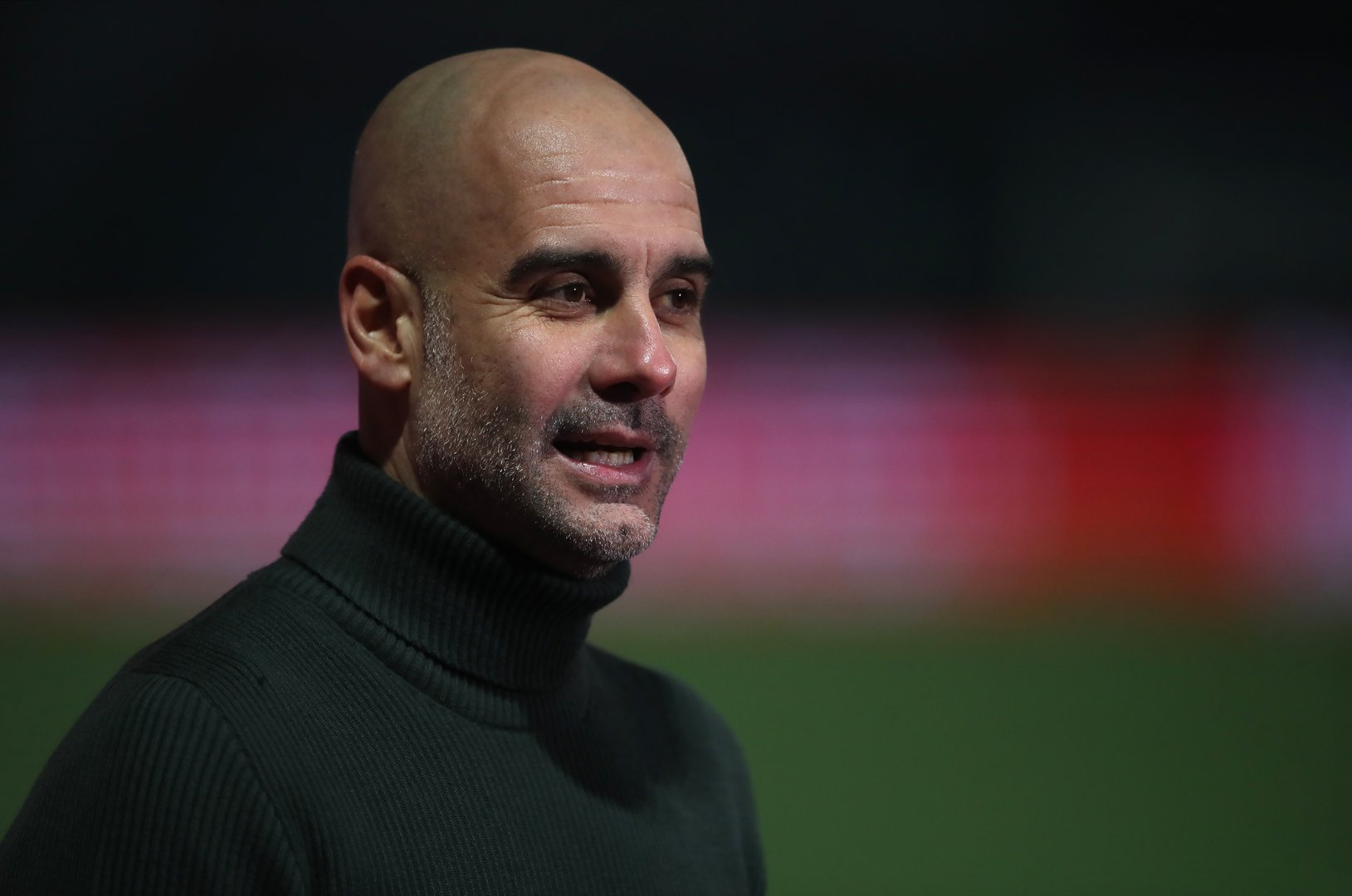 image Pep Guardiola concerned about state of Etihad pitch