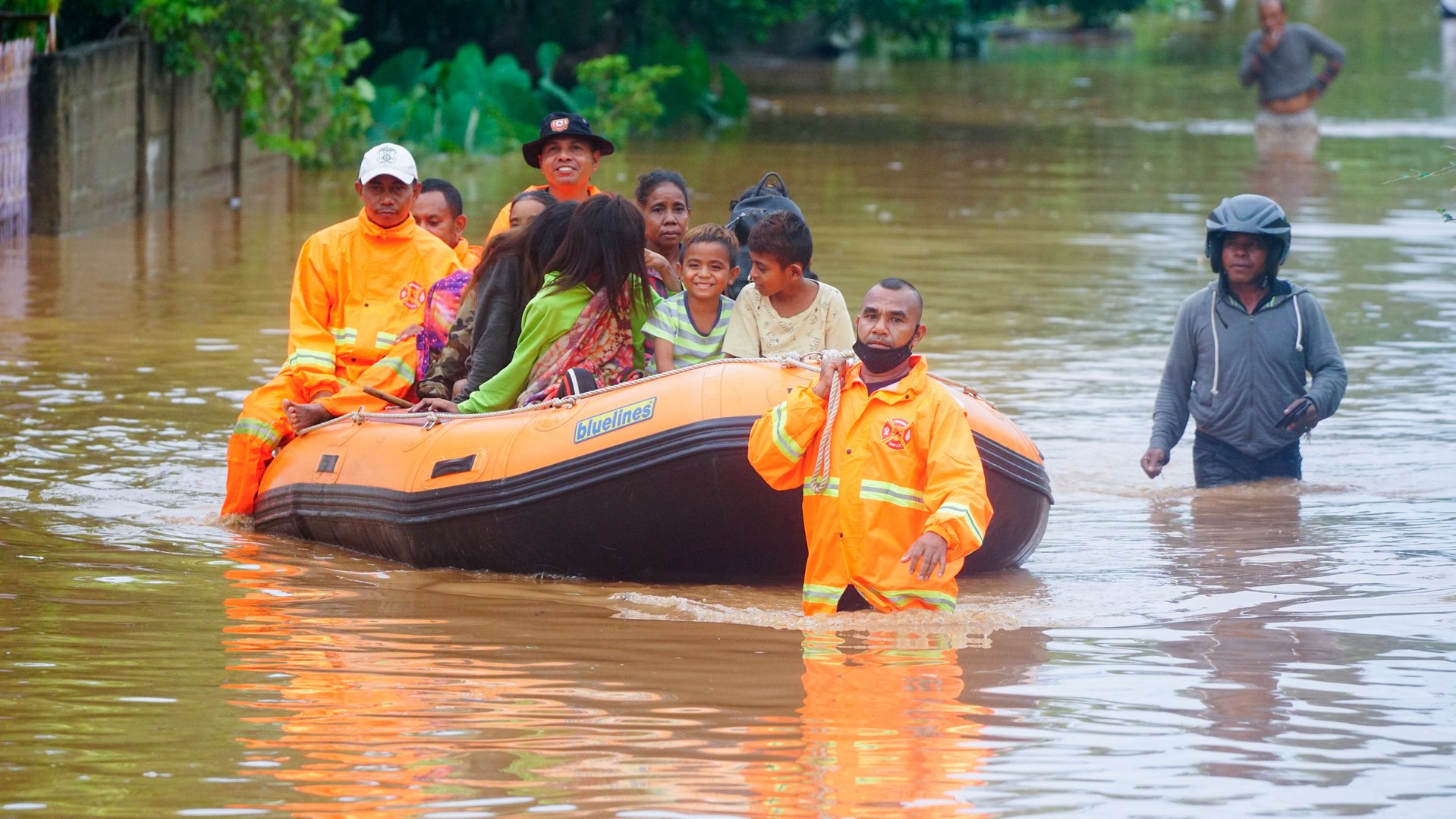 image Floods, landslides, kill dozens in Indonesia and East Timor