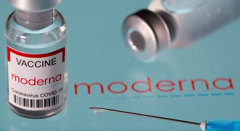 file photo: vial labelled "moderna coronavirus disease (covid 19) vaccine" placed on displayed moderna logo is seen in this illustration picture