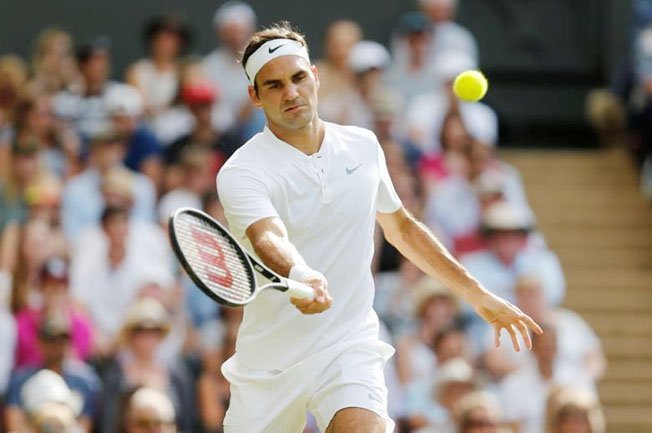 image Federer playing French Open with eye on Wimbledon