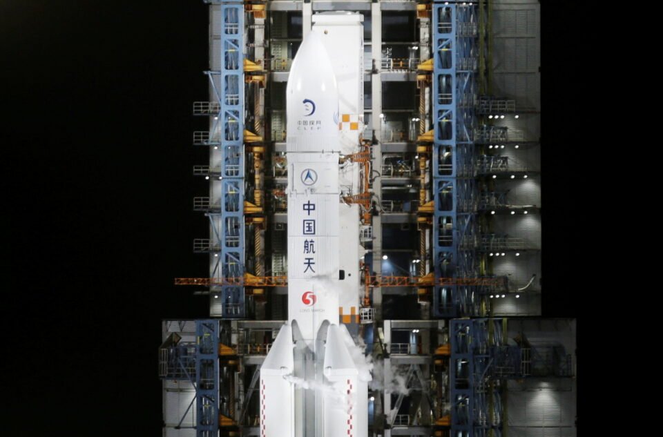 file photo: the long march 5 y5 rocket, carrying the chang'e 5 lunar probe, is seen before taking off from wenchang space launch center, in wenchang