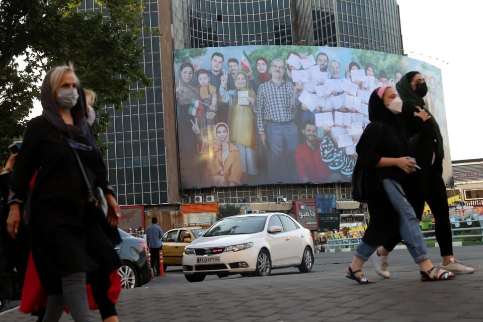 file photo: a banner of the presidential election is seen in valiasr square in tehran