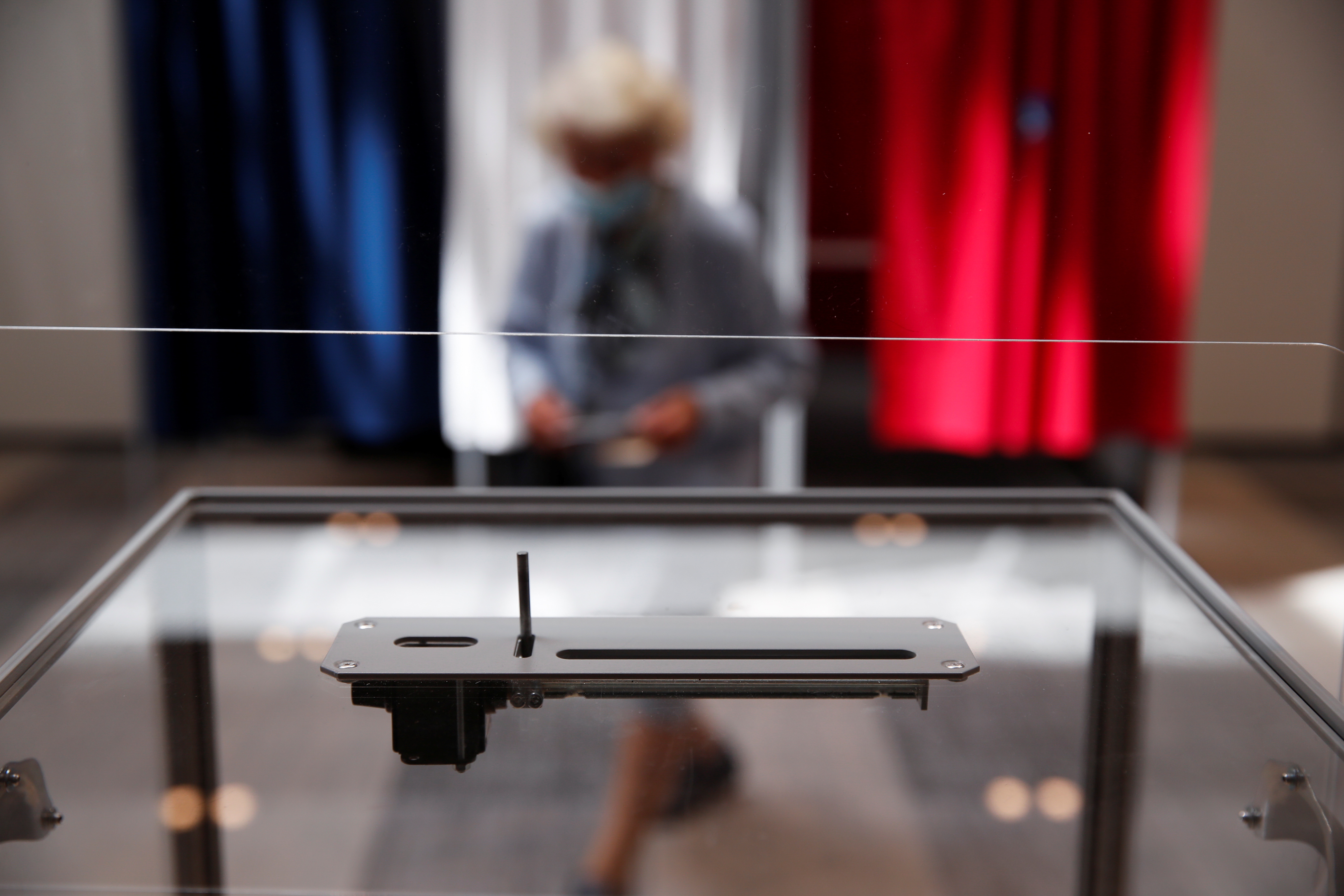 image French far-right polls ahead in regional vote in southern battleground