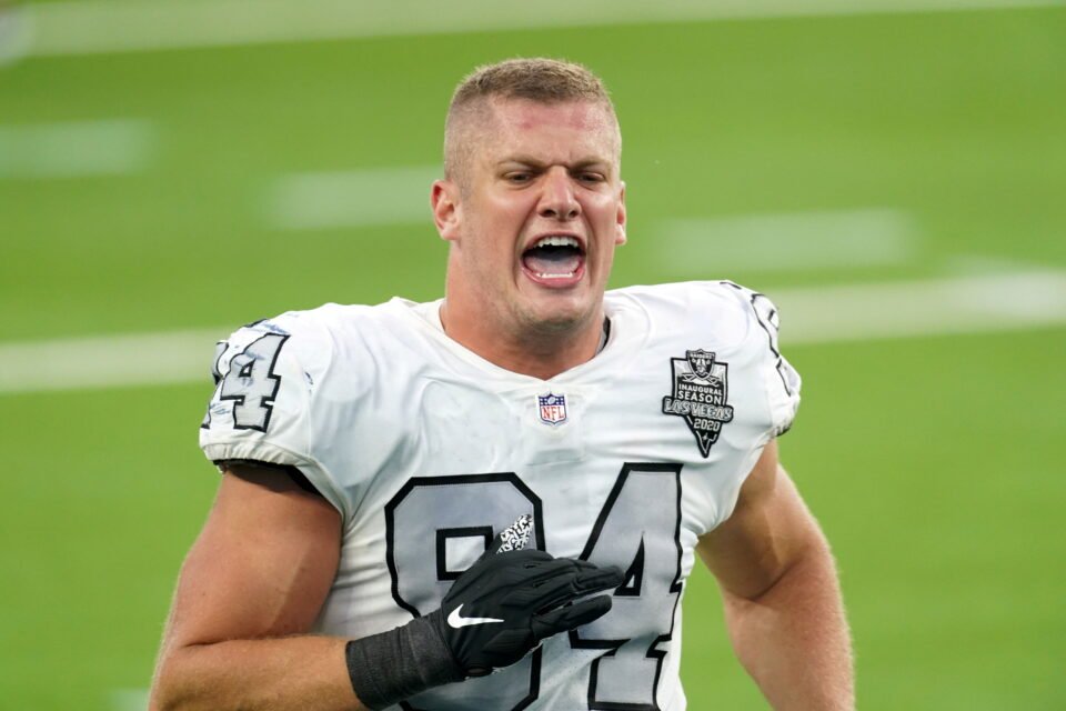 file photo: las vegas raiders defensive end carl nassib celebrates at the end of the game in inglewood