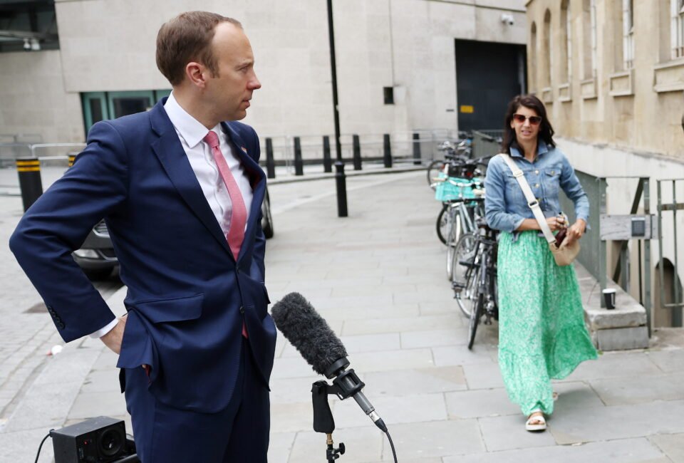 britain's health secretary matt hancock and gina coladangelo stand outside the bbc headquarters in london