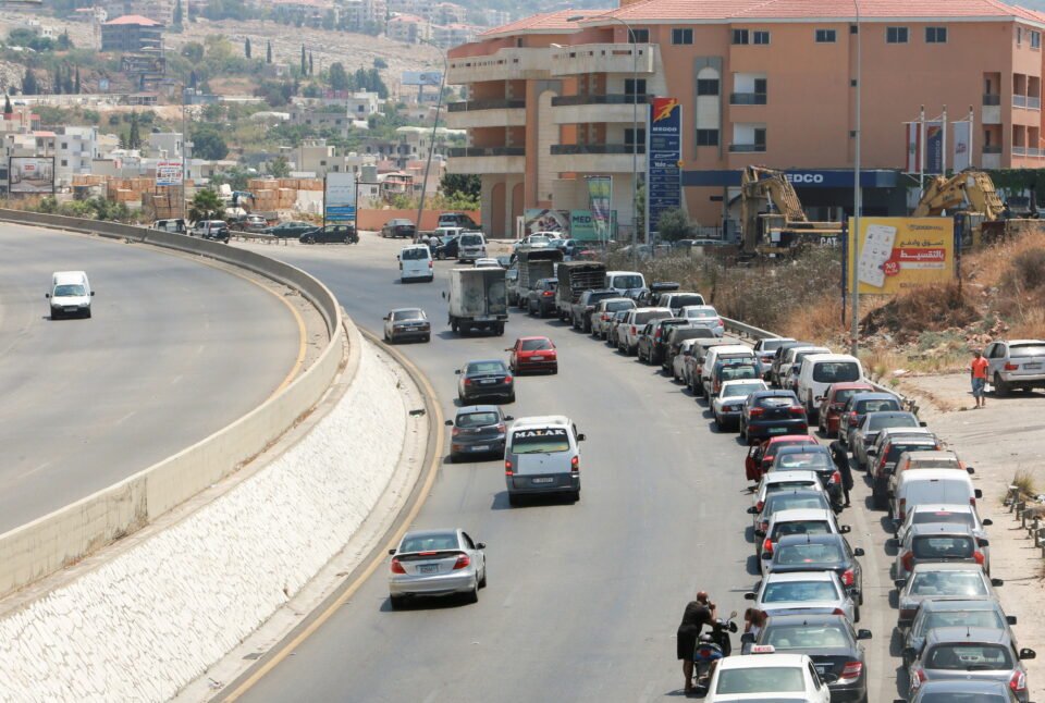 file photo: cars stand in line near a gas station as they wait to fuel up in jiyeh