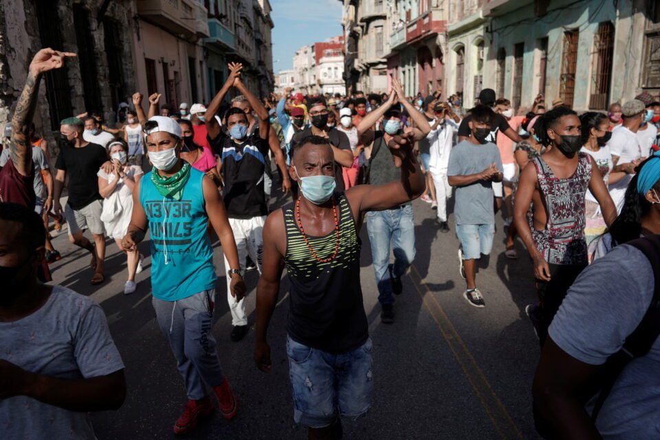 people shout slogans against the government during a protest in havana