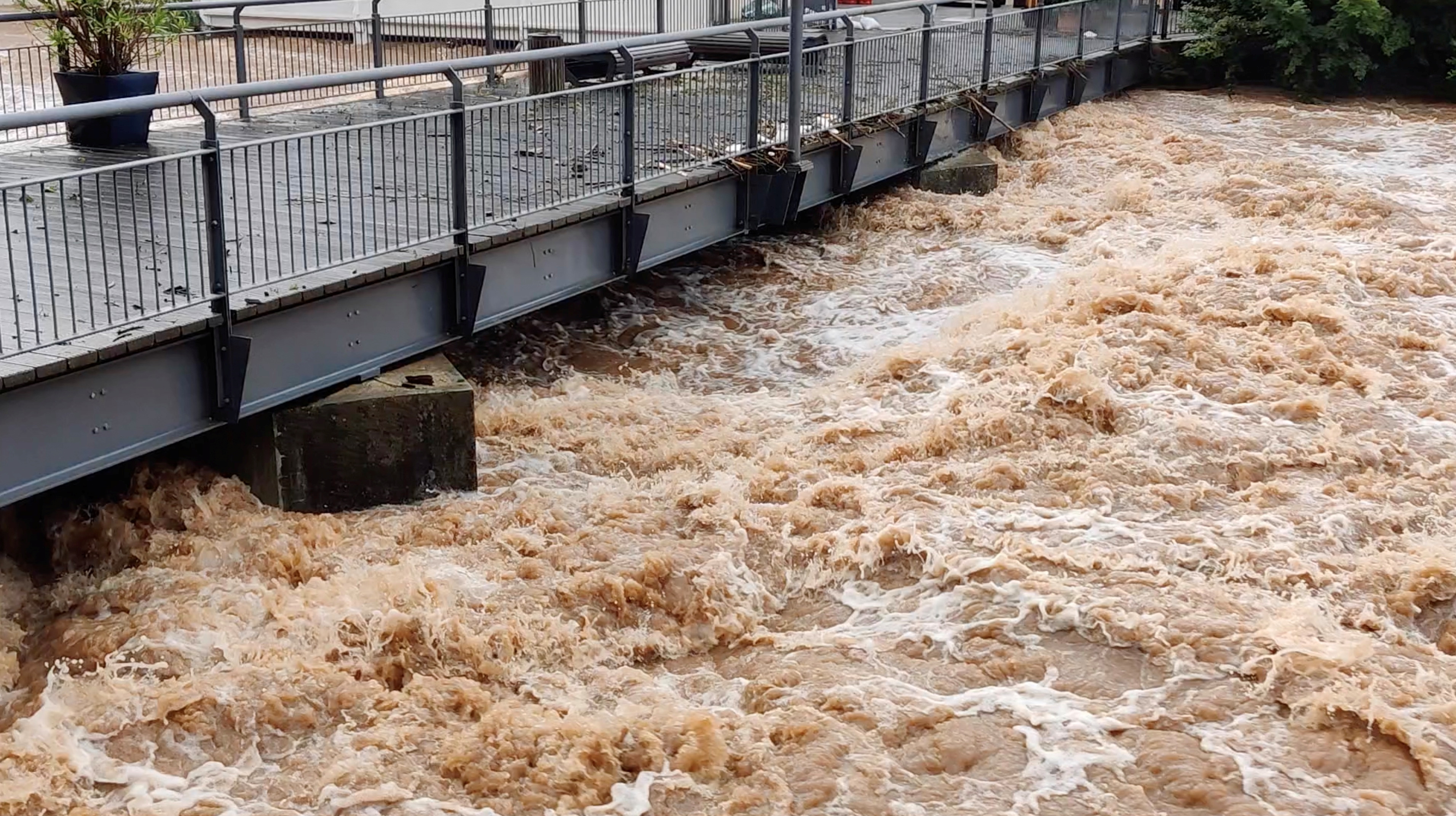 rising water rushes through german town of kyllburg
