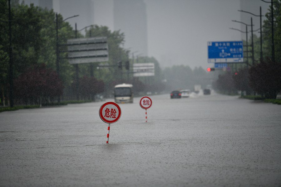 image Tens of thousands evacuated as China storms spread northwards