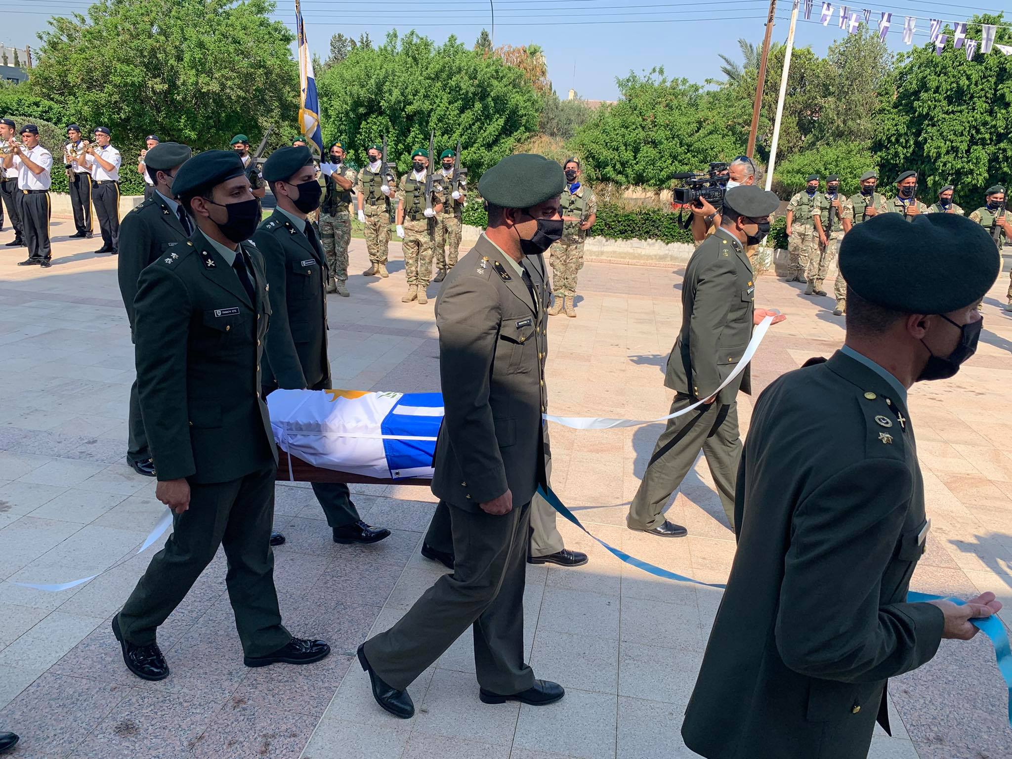 cover Remains of missing Greek officer handed over for burial