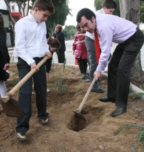 feature antigoni mayor of nicosia constantinos yiorkadjis planting trees with school pupils