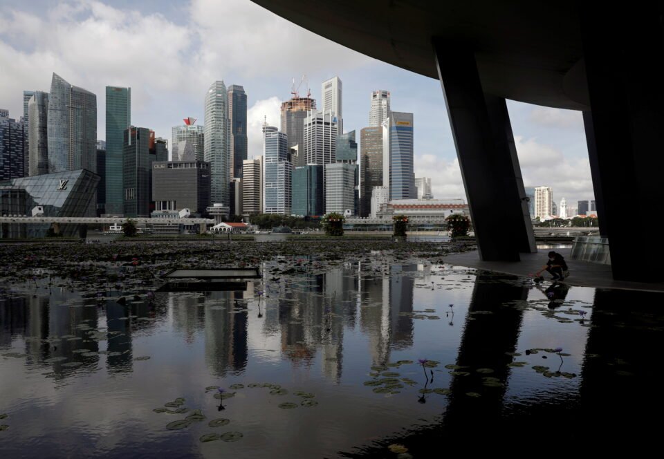 file photo: file photo: a view of the city skyline in singapore