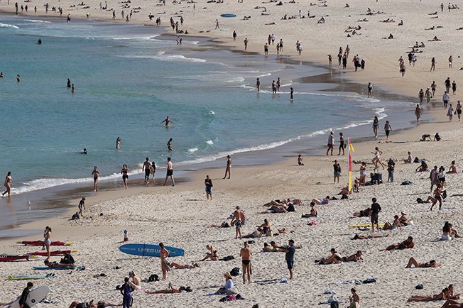 image Australia reports record daily Covid cases, braces for worse