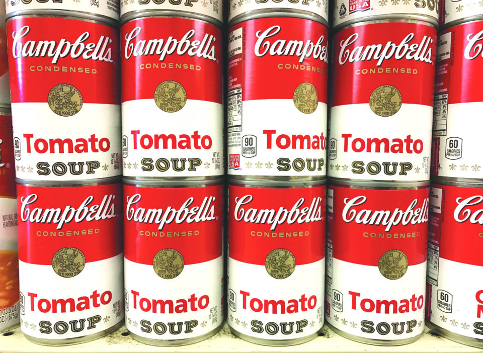 file photo: tins of campbell's tomato soup are seen on a supermarket shelf in seattle