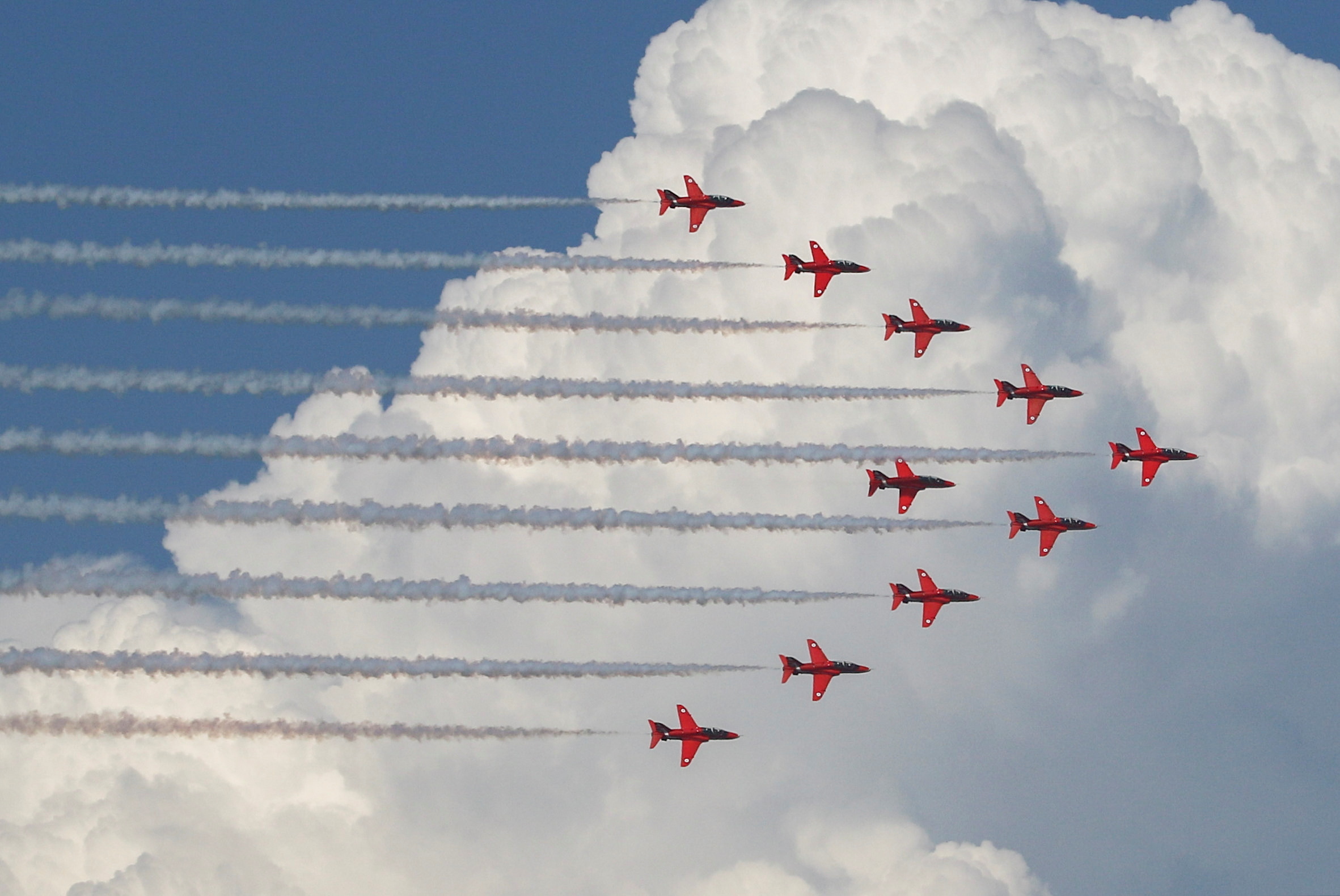 the british royal air force red arrows flying display team fly over episkopi british military base