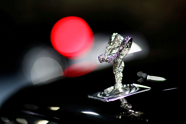 file photo: the "spirit of ecstasy" bonnet ornament of a rolls royce car is seen at the headquarters of chabe, chauffeured cars services, in nanterre