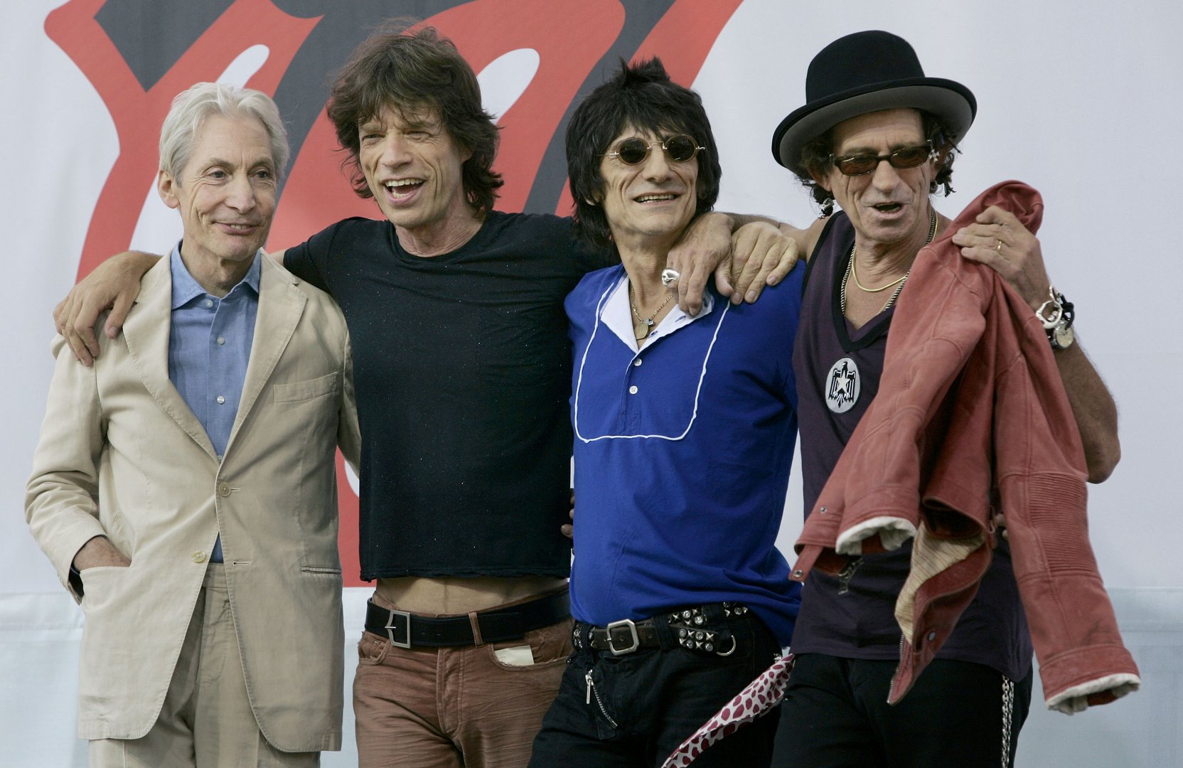 cover Jagger calls Watts the rock that held the Rolling Stones together