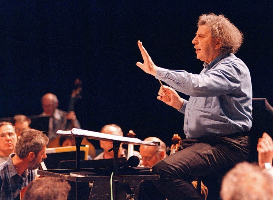 file photo: greek composer mikis theodorakis conducts the skopje's opera orchestra during a rehearsal in the macedonian capital