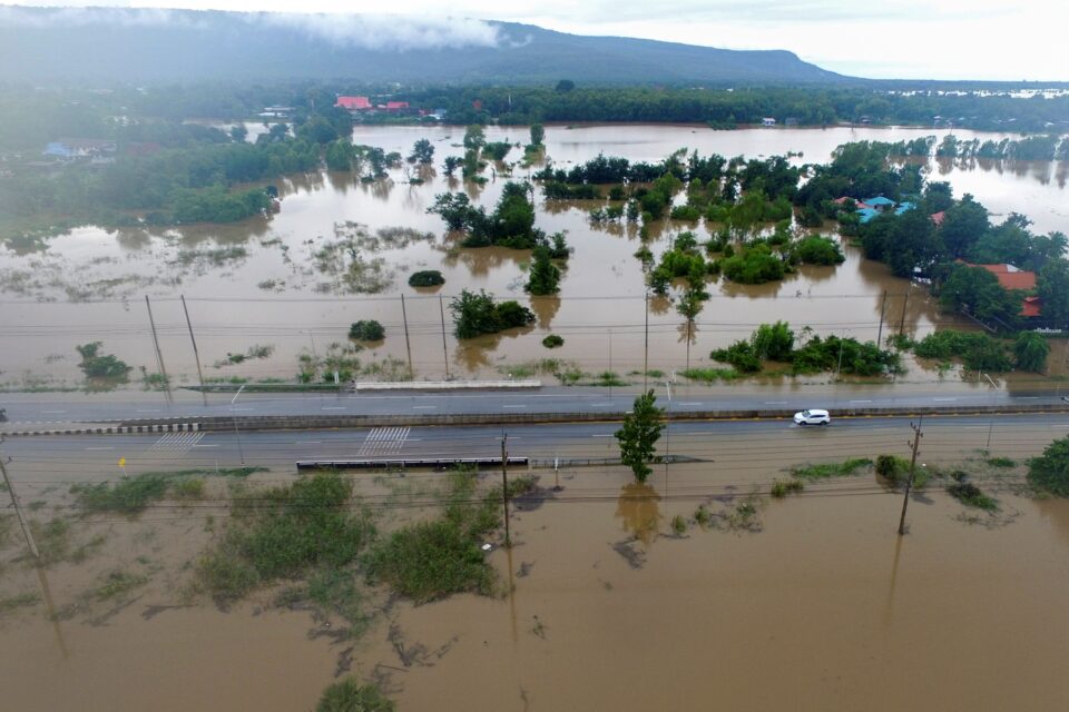 a car ride throught a flooded road in phitsanulok province