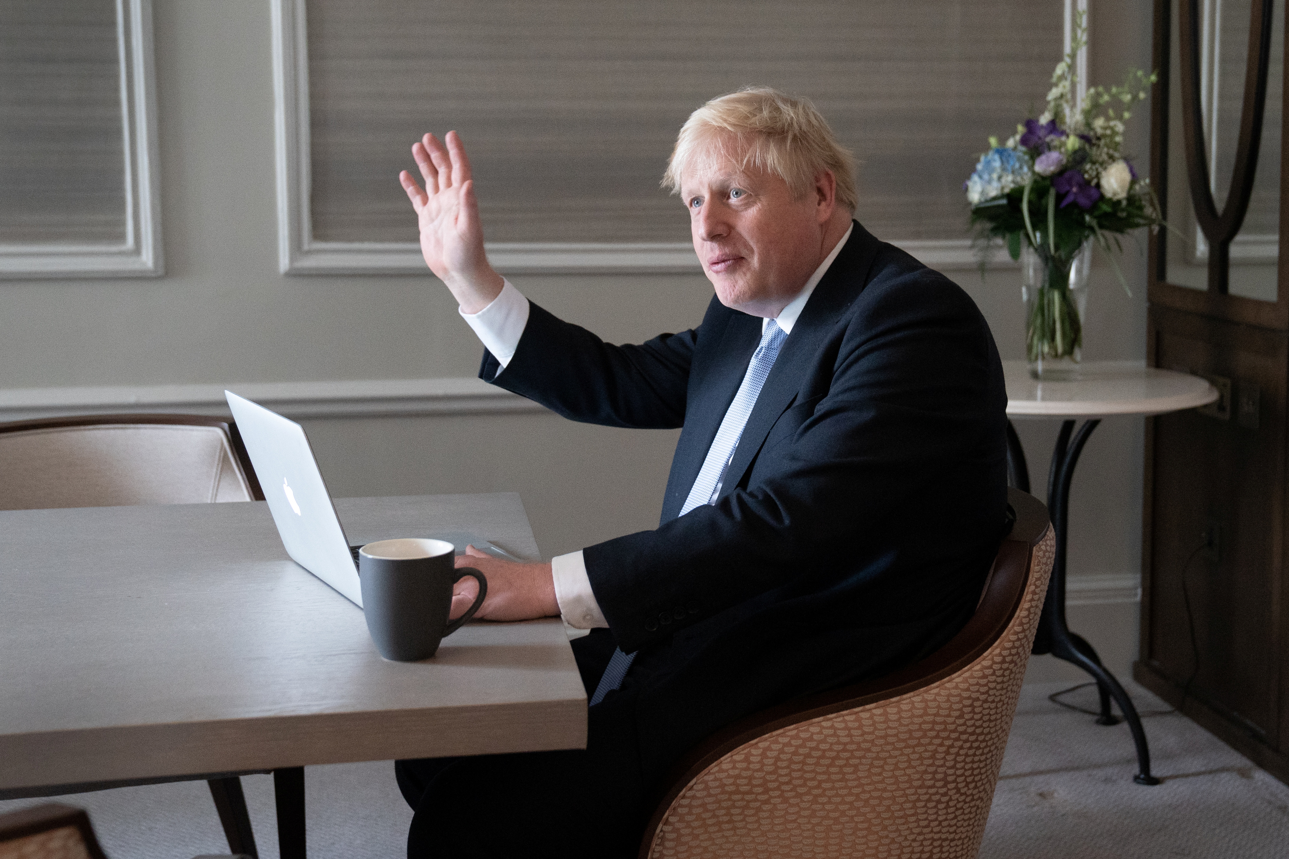 image Under fire, UK PM Johnson tries to return to election agenda