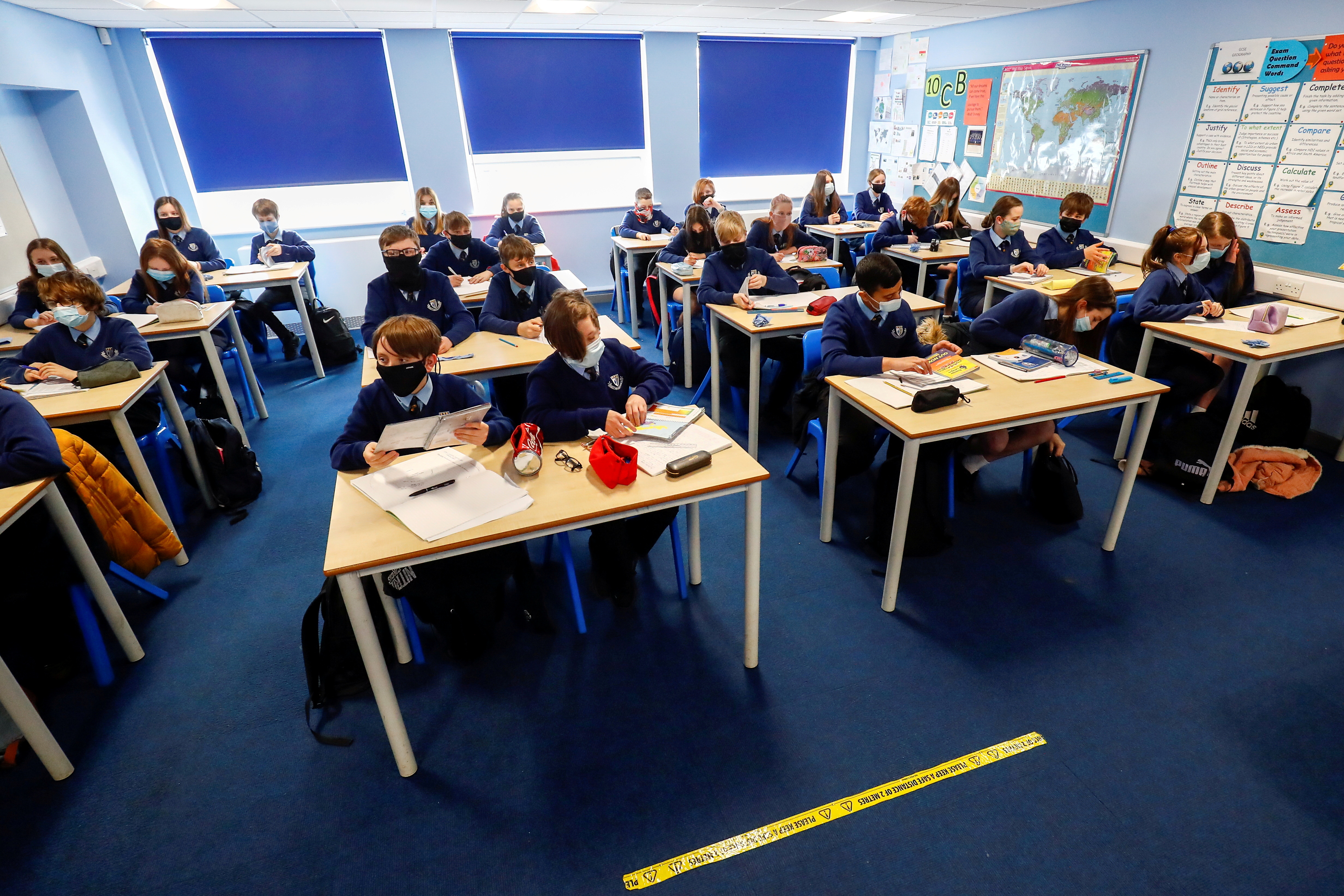 image English school return spurred COVID in children, but cases fell in adults