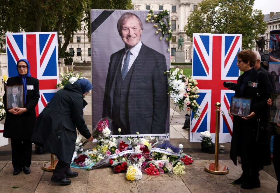 file photo: people pay tribute to late british mp david amess, in london