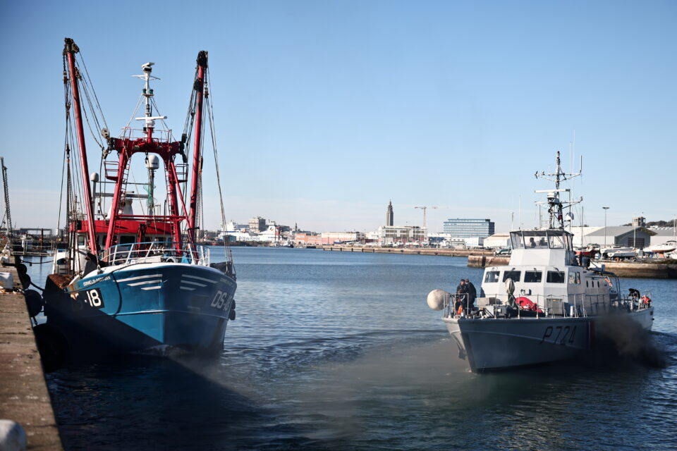 the french gendarmerie patrol boat athos and a british trawler cornelis gert jan are seen in le havre