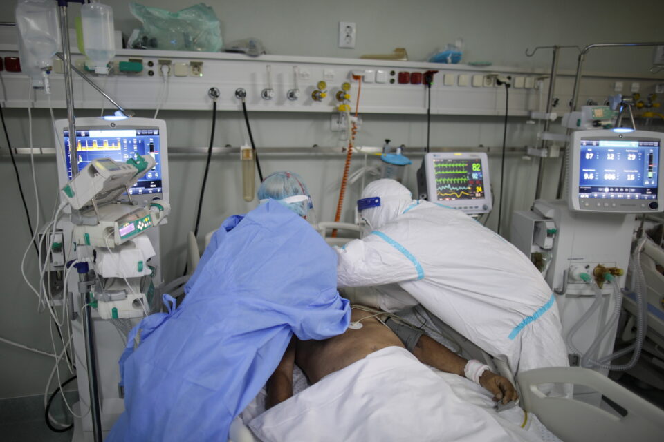 an intensive care unit (icu) doctor and nurse assist a covid 19 patient at marius nasta institute of pneumology, in bucharest