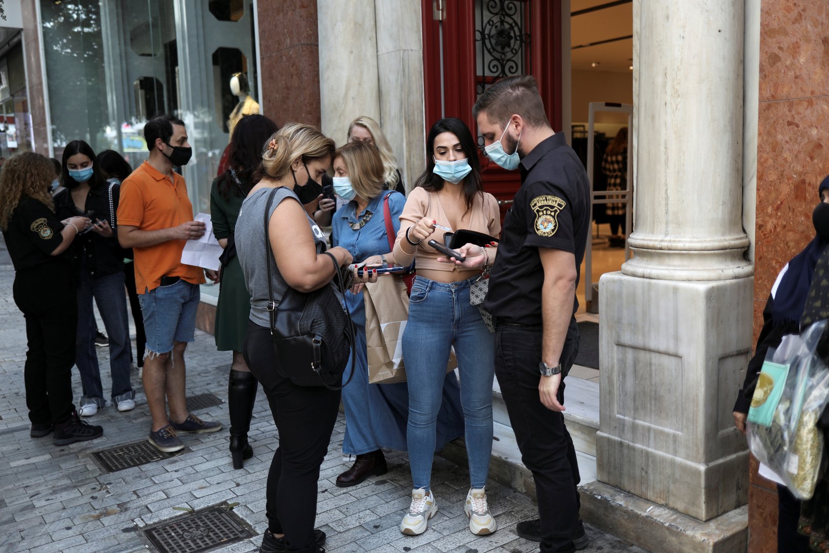 cover Unvaccinated in Greece face new restrictions as Covid cases soar
